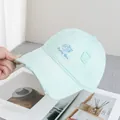 Close-up of mint green distressed baseball cap with cat embroidery and Pretty Nice text - Adjustable / Green