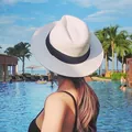 Women's wide brim straw sun hat with black ribbon, white woven beach hat for summer vacation - M (56-58cm) / White