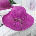 Detail of purple wide-brim woven straw hat with elegant brown ribbon bow decoration - M(56-58cm) / Rose Red