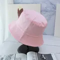 Detailed close-up of pink bucket hat stitching on canvas brim with a minimalist design - Pink and Black