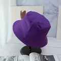 Close-up of a purple cotton bucket hat showing parallel stitching on the brim detail - Purple And Black