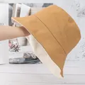 Reversible cotton fisherman bucket hat in mustard yellow and off-white solid colors - Reversible / Khaki