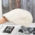 Detailed close-up showing the beige cotton twill fabric texture of the newsboy cap - Adjustable / Beige