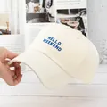 Detail of cream baseball cap featuring blue HELLO WEEKEND embroidery on cotton fabric - Adjustable / Beige