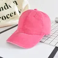 Classic washed pink cotton baseball cap with vintage distressed texture and curved brim - Adjustable / Rose Red