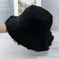 Detailaufnahme eines schwarzen Fischerhutes aus Baumwolle mit ausgefranstem Saum Design - M(56-58cm) / Schwarz