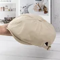 Detail van de beige krantenjongenspet met katoenen textuur en verstelbare metalen gesp achter - Verstelbaar / Beige