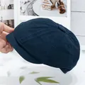 Close-up of navy cotton docker hat showing twill texture and six-panel stitching - Navy Blue