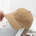 Detail of khaki cotton baseball cap with cute corgi embroidery and breathable eyelets - Adjustable / Khaki