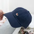 Detail of dark blue cotton baseball cap featuring high-quality Corgi embroidery work - Adjustable / Navy Blue