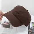 Detail view of washed dark brown cotton baseball cap fabric texture and reinforced brim stitching - Adjustable / Coffee