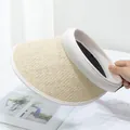 Close-up of natural straw weave texture and cream fabric edge on wide brim sun hat - Adjustable / Beige (Beige Trim)