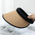 Macro view of woven straw sun visor texture and black fabric trim detailing - Adjustable / Khaki