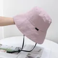 Detail of light pink sun hat with quick-dry nylon texture and adjustable black drawstring - One Size / Pink