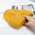 Chunky ginger yellow rabbit fur knit beanie hat with rolled cuff for winter warmth - Turmeric
