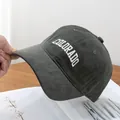 Detailed view of the Colorado embroidery on a charcoal grey soft cotton baseball cap - Dark Gray