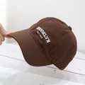 Close-up of vintage brown cotton baseball cap featuring Brooklyn embroidery detail - Adjustable / Coffee
