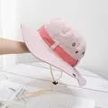 Detail of pink sun hat with metal air vents and adjustable windproof strap for outdoors - M (56-58cm) / Pink
