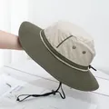 Detail of wide-brim sun hat showing breathable metal eyelets and adjustable wind rope - Beige Top Army Green Brim