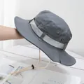 Detail of grey outdoor sun hat with metal air vents, reinforced strap, and windproof cord - M (56-58cm) / Light Gray