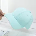 Detail of mint green lightweight quick-dry baseball cap with textured breathable fabric - Adjustable / Cyan Green