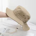 Detail of khaki outdoor sun hat with wide brim, metal vents and adjustable wind rope - M (56-58cm) / Khaki