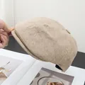 Dettaglio del berretto in cotone e lino kaki traspirante che mostra la trama del tessuto - Regolabile / Beige