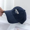 Detailed shot of white BOSTON 1830 embroidery on a navy blue cotton baseball cap - Regular Size (54-58CM) / Navy Blue