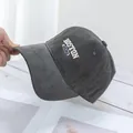 Detailed embroidery of BOSTON 1930 letters on a premium dark gray cotton baseball cap - Gray
