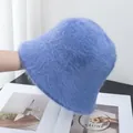 Detail of soft royal blue faux fur bucket hat with fluffy texture and warm plush material - Adjustable / Blue