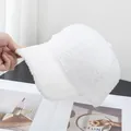 Detailed texture of white faux shearling baseball cap with plush fleece finish - Adjustable / White