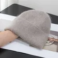 Detail of soft plush rabbit fur beanie in khaki with ribbed knit texture and wide cuff - Khaki
