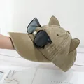 Detailed close-up of khaki baseball cap with cat ears and decorative aviator sunglasses - Cat Ear & Sunglasses Style / Cat Ear & Sunglasses - Khaki