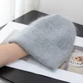 Close-up of a grey plush rabbit fur beanie featuring thick knit texture and wide cuff - Medium Grey