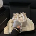 Cream satin bucket bag with floral print and pearl handle in elegant gift box - White