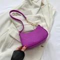 Purple chevron quilted baguette bag with gold chain strap and leather shoulder detail - Purple With Coins