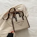 Sac cabas en toile et cuir beige avec poignées marron et bandoulière réglable - Marron