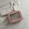 Neceser portátil rosa claro con ventana transparente y asa de transporte resistente - Rosa