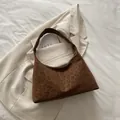 Bruine vintage hobo-tas met luipaardprint, brede band en gouden rits op witte stof - Bruin