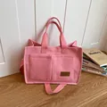 Sac cabas rose en toile avec poches avant et bandoulière réglable pour femmes en style - Rose