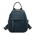Mini zaino da donna blu navy in morbida pelle con trama a litchi e dettagli in metallo dorato - Blu