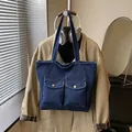 Deep blue denim tote bag with large front pockets and golden buttons for daily commute - No Pendant / Dark Blue