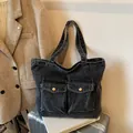 Deep grey washed denim tote bag with dual front flap pockets and golden metal buttons - No Pendant / Sand Wash Black