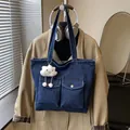 Deep blue denim tote bag with two front pockets and a cute cloud charm for women - With Cloud Pendant / Dark Blue