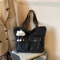Deep grey washed denim tote bag with front pockets and white plush cloud charm - With Cloud Pendant / Sand Wash Black