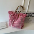 Pink and white checkered woven tote bag with fringe details and brown leather straps - Rose Pink