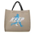 Eco-friendly natural jute tote bag with blue Keep printing and black woven handles - Style 3