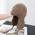 Detailed texture of brown knit trapper hat with thick ribbing and ear flaps - M (56-58cm) / Dark Khaki