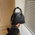 Mini black litchi pattern shell bag with metal chain strap and top handle - 15.5cm x 12cm x 7cm / Black