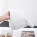 Gros plan sur l'intérieur doux en peluche et la maille épaisse du bonnet en laine d'alpaga - M (56-58cm) / Crème